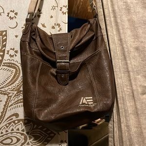 American Eagle bag over the shoulder adjusting strap